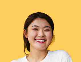 Boost Your Business with Our Expert Web Design Agency in Perth 2 a woman smiling with a yellow background